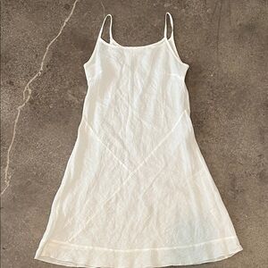 Purchased in Italy. White Linen Strap Slip Dress. Length 44”. Pit to pit 16”.